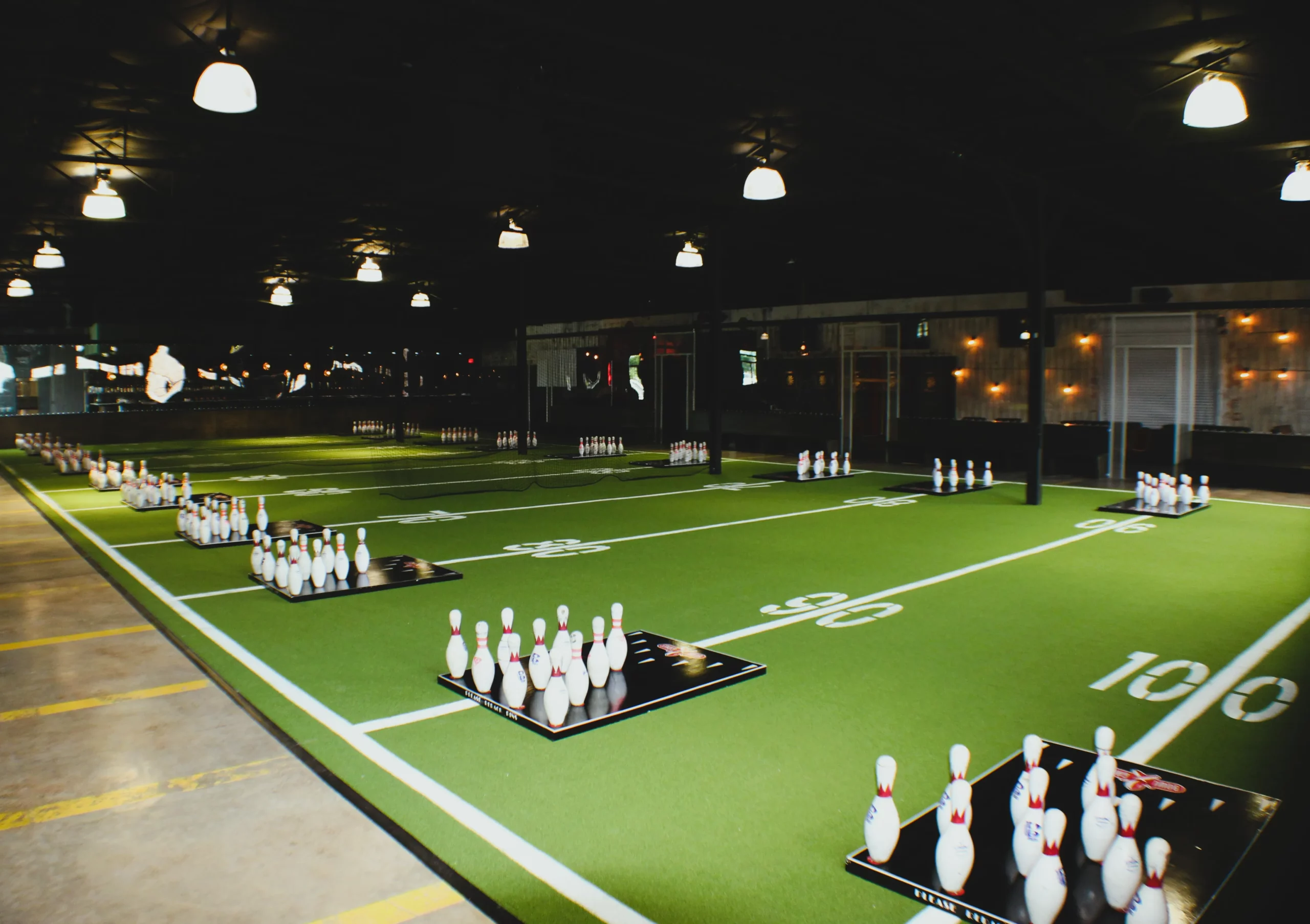 Get ready to toss! This action-packed PinToss field at BowGames brings friends together for competitive fun, food, and drinks.