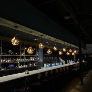 BowlGames bar bounty! A sprawling expanse of drinks & spirits awaits at this hangout.